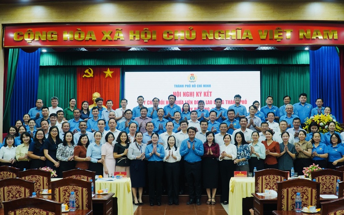 LĐLĐ TPHCM k&yacute; quy chế phối hợp với 36 địa phương khu vực B&igrave;nh Dương cũ - Ảnh 4.