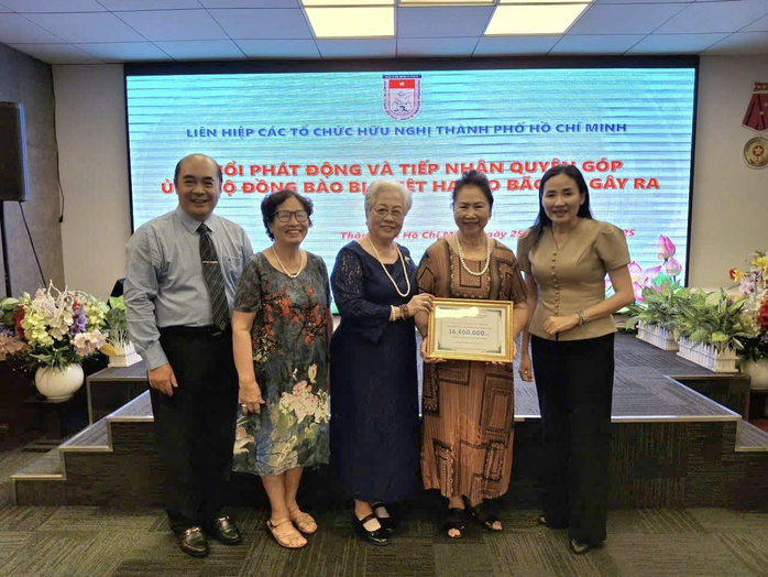 Lặng thầm cống hiến cho cộng đồng - Ảnh 1.