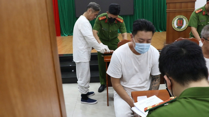 Công an TPHCM tiếp nhận 33 công dân do Mỹ trục xuất - Ảnh 2.