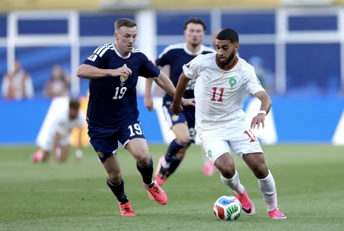 Thắng nhẹ nhàng Scotland, Morocco giành vé sớm vào vòng knock-out - Ảnh 1.