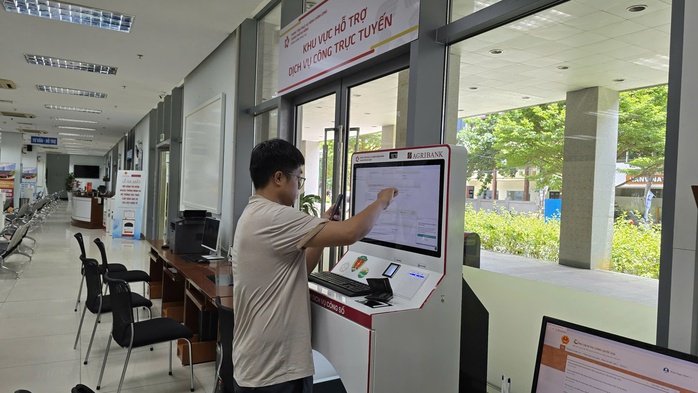 Đà Nẵng ra mắt 11 Trạm dịch vụ công số ứng dụng AI - Ảnh 3.