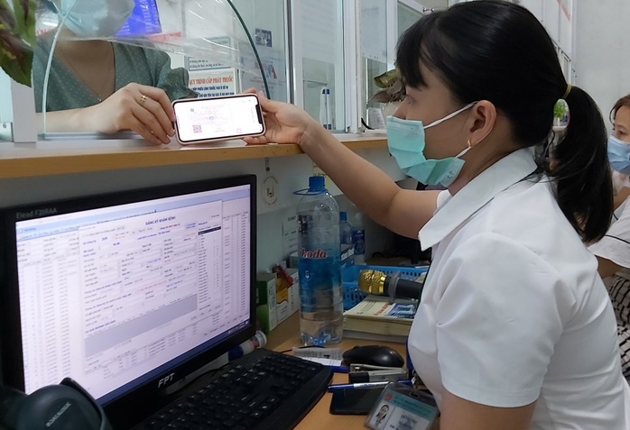 Sắp &aacute;p dụng danh mục m&atilde; kh&aacute;m chữa bệnh, m&atilde; khoa BHYT mới - Ảnh 1.