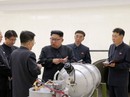 Giải mã bức ảnh ông Kim Jong-un kiểm tra đầu đạn hạt nhân Giải mã bức ảnh ông Kim Jong-un kiểm tra đầu đạn hạt nhân