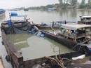 Sự thật về chiếc thuyền chở hóa chất chìm trên sông Đồng Nai Sự thật về chiếc thuyền chở hóa chất chìm trên sông Đồng Nai