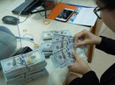 Ứng phó với biến động tỉ giá Ứng phó với biến động tỉ giá