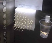 Trang bị tăm để... bấm nút thang máy phòng Covid-19