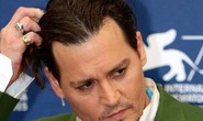 Cướp biển Johnny Depp dàn xếp êm vụ kiện 25 triệu USD