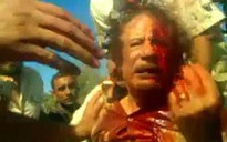 Bán đấu giá nhẫn cưới, áo dính máu của ông Gaddafi