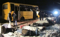 Đông Ukraine: Xe buýt trúng tên lửa Grad, 11 người chết
