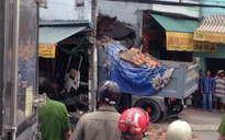 Xe tải mất lái tông nhà mặt tiền đường, 2 người chết