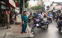 Một người bị chém lìa tay trên đường phố TP HCM