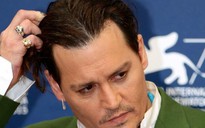 "Cướp biển" Johnny Depp dàn xếp êm vụ kiện 25 triệu USD