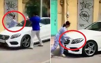 Bị thách thức, người phụ nữ dùng búa đập xe sang đậu trước nhà