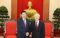 Tổng Bí thư, Chủ tịch nước Nguyễn Phú Trọng chúc mừng tân Tổng Bí thư Lào
