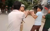 Bị nhóm người đuổi đánh, cán bộ CSGT rút súng bắn chỉ thiên