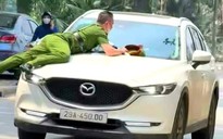 “Xế hộp” Mazda CX5 lạng lách, hất văng công an trên nắp capo xuống đường