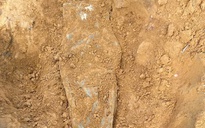 Tìm thấy 2 hài cốt liệt sĩ bên cạnh là 2 túi da đựng tài liệu 