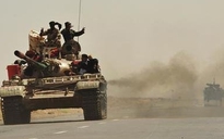 Đoàn xe bọc thép đưa ông Gaddafi lánh nạn?