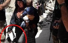 Rợn người hình ảnh mẹ IS ôm con đánh bom tự sát