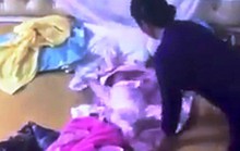 Người giúp việc nói lý do tra tấn bé 2 tháng tuổi