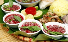 Điểm tâm sáng bằng tiết canh chó, người đàn ông bị liệt tứ chi