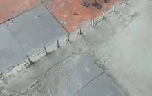 Đập bỏ hàng đinh nhọn nguy hiểm gắn trên vỉa hè trước nhà