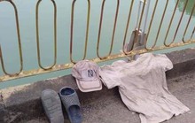 Người đàn ông cởi áo, bỏ mũ, nhảy sông tự tử trước sự bàng hoàng của nhiều người