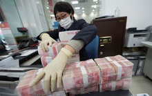 Trung Quốc khử trùng, cách ly tiền giấy để ngăn chặn Covid-19