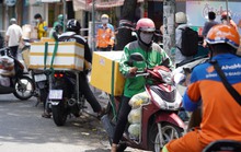 TP HCM: Shipper phải phun khử khuẩn hàng hoá, tiền... trước khi giao nhận