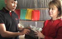 Tài xế taxi trả lại chiếc ví có 4.000 USD cho nữ Việt kiều Mỹ