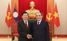 Nguyên Tổng Bí thư Nông Đức Mạnh tiếp Tổng Bí thư, Chủ tịch nước Lào