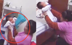 Check camera, mẹ tá hỏa thấy con trai hơn 1 tuổi bị người giúp việc giật lắc, bạo hành