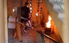Xử phạt người phụ nữ đốt vàng mã ở cầu thang khu tập thể