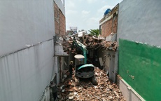 Cận cảnh hàng loạt nhà dân dọc Quốc lộ 13 đang tiến hành tháo dỡ