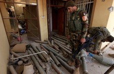 IS bắn chết 40 dân thường ở Mosul, treo xác lên cột điện