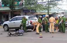 Không đội mũ bảo hiểm tông đuôi ô tô, 2 người thương vong