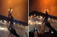 'Fan cuồng' cố trèo lên 'sân khấu bay' của Kanye West