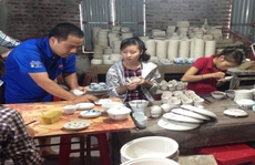 Người thổi lửa lò gốm cổ