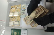Xách va li tiền sang Hàn Quốc, nữ hành khách bị tạm giữ