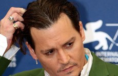 'Cướp biển' Johnny Depp dàn xếp êm vụ kiện 25 triệu USD