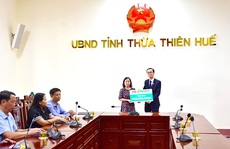 FE CREDIT trao tặng gia đình liệt sĩ Phạm Văn Hướng 300 triệu đồng