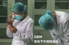 Biết tin mẹ mất, nữ y tá Vũ Hán khóc lạy 3 lần rồi quay lại làm việc