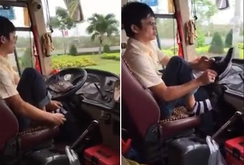 Đình chỉ tài xế buông vô-lăng để mang giày