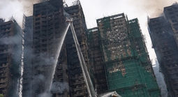 Đằng sau thảm họa cháy chung cư ở Hồng Kông