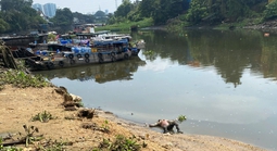 Phát hiện thi thể trôi sông Sài Gòn, bụng xăm 2 con thằn lằn