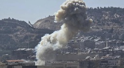 Israel ném bom trụ sở Bộ Quốc phòng Syria