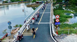 Cầu Phú Định mở rộng, người dân đi lại dễ thở hơn