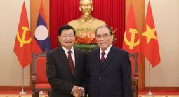 Nguyên Tổng Bí thư Nông Đức Mạnh tiếp Tổng Bí thư, Chủ tịch nước Lào