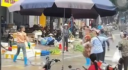 Khởi tố người phụ nữ dùng vòi rửa xe cao áp xịt chảy máu mắt bà bán rau