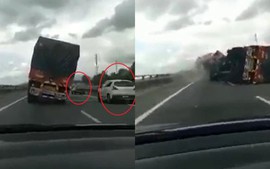 Clip: Hai ô tô thoát nạn trong gang tấc khi xe tải lật nhào